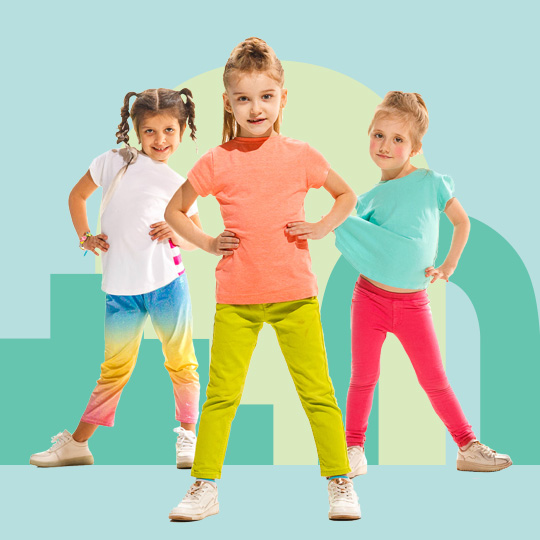 Group of three girls standing with hands on hips smiling at the camera with colourful shapes in the background